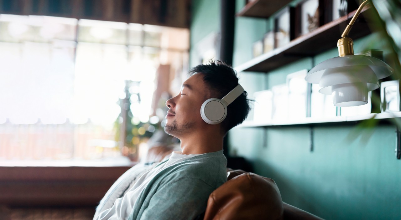 Person relaxing with headphones
